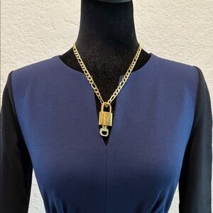 Louis Vuitton #321 Lock and Key Brass Gold with Necklace Gold Chain (unbranded)